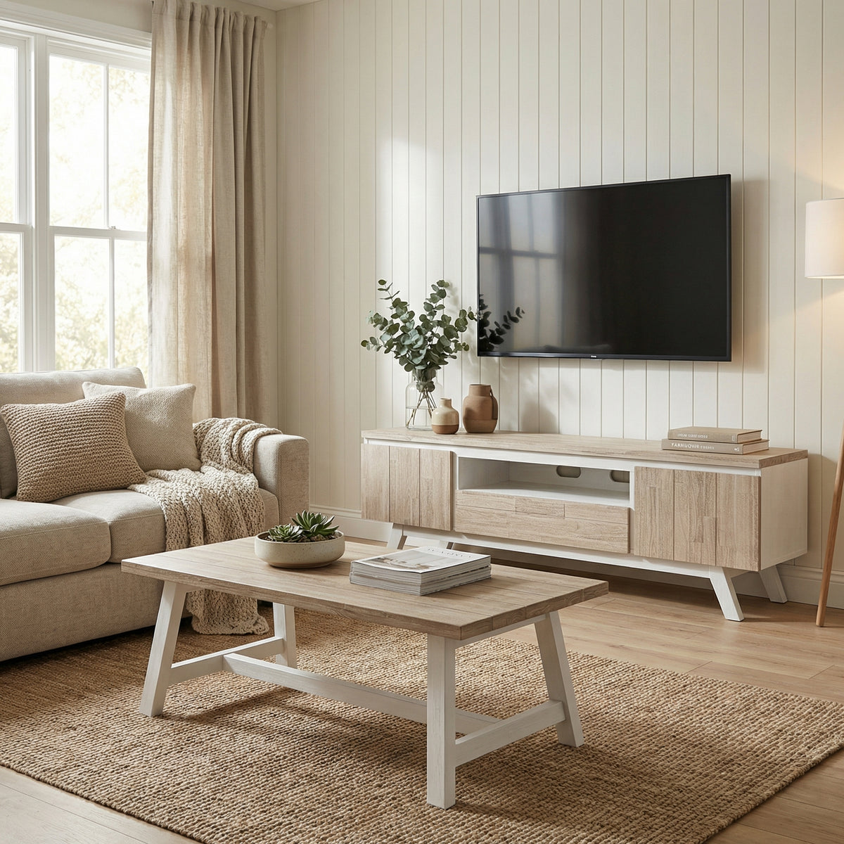 Modern living room with beige sectional sofa, wooden coffee table, and TV stand.

