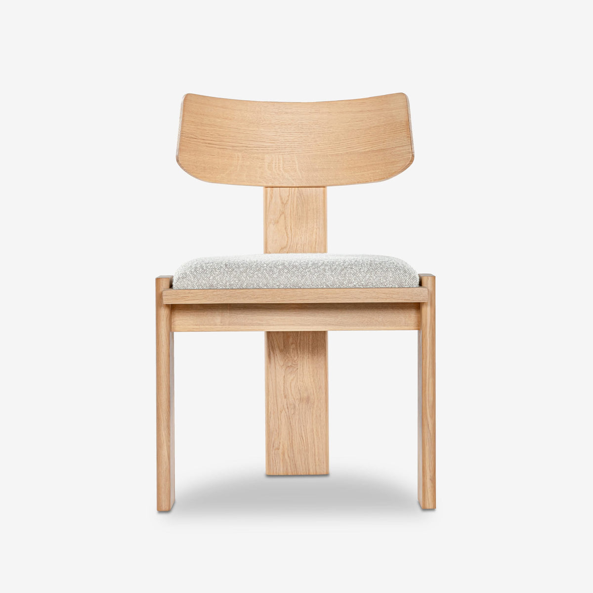 Wooden chair with a white cushion on a light gray background

