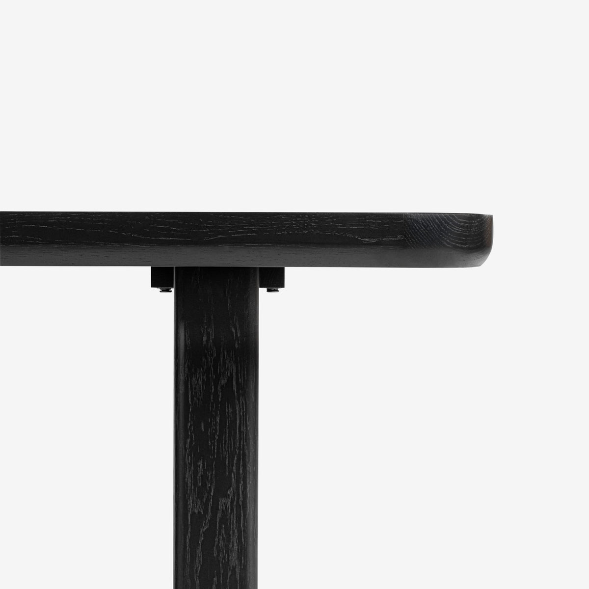 Black wooden table leg on a white background

