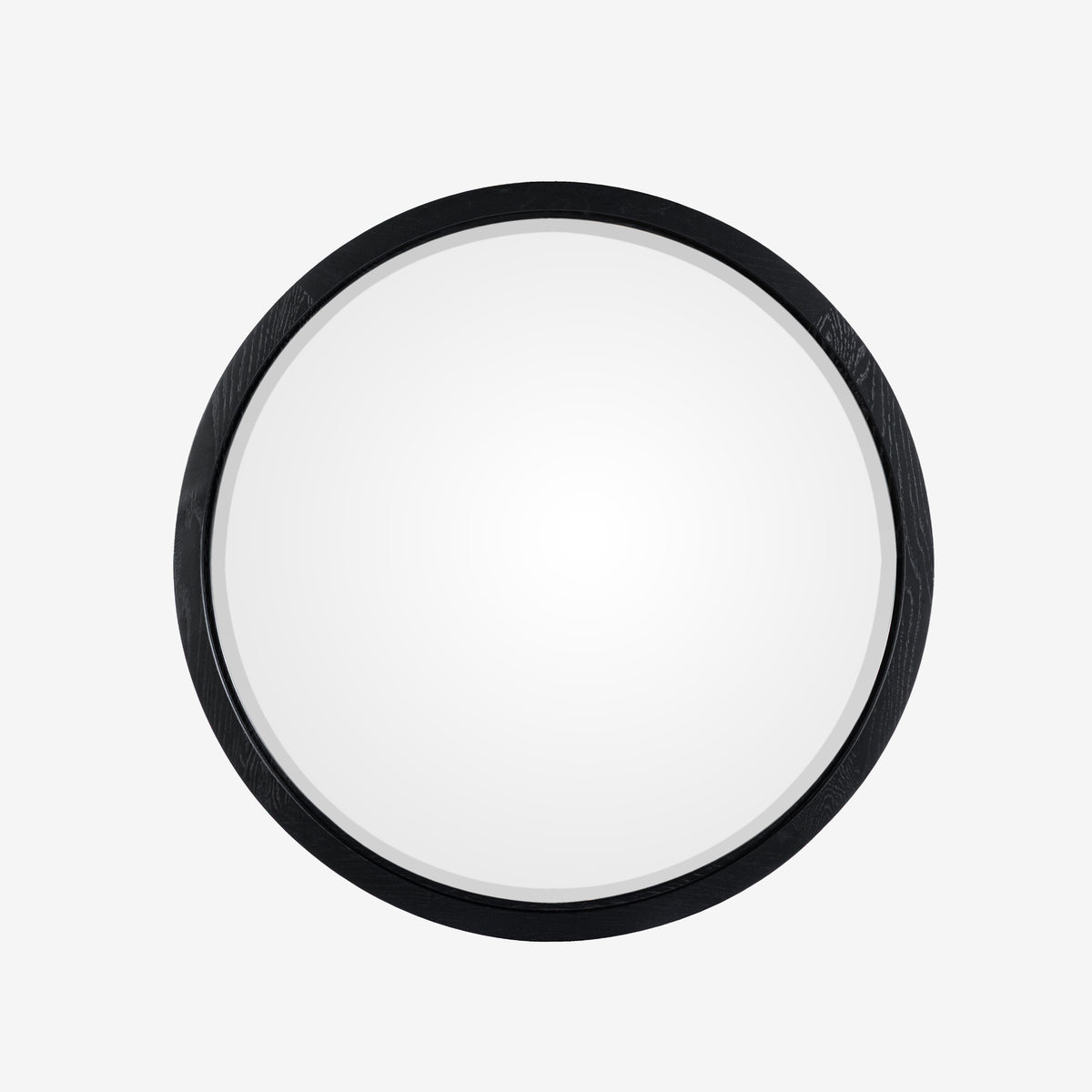 Round white object with black rim on a white background

