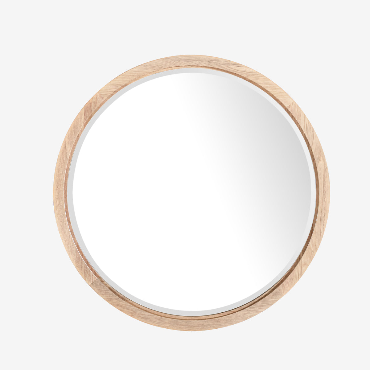 Round mirror with a wooden frame on a white background

