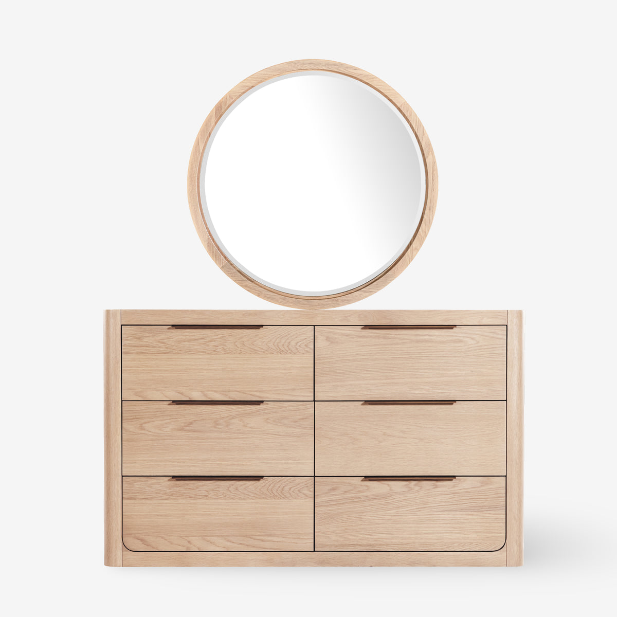Wooden dresser with round mirror on a white background

