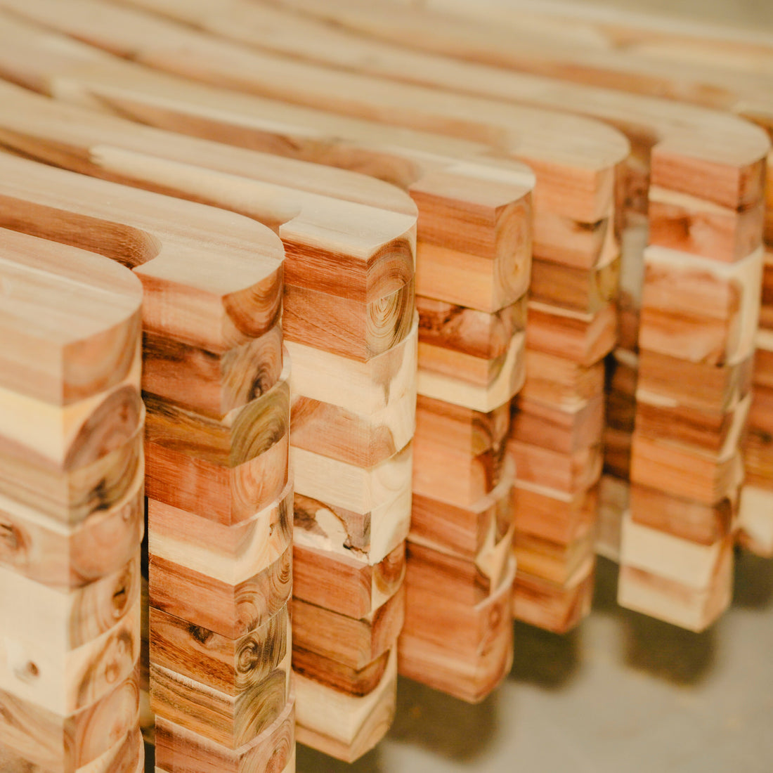 Stacks of wooden blocks on a gray surface
