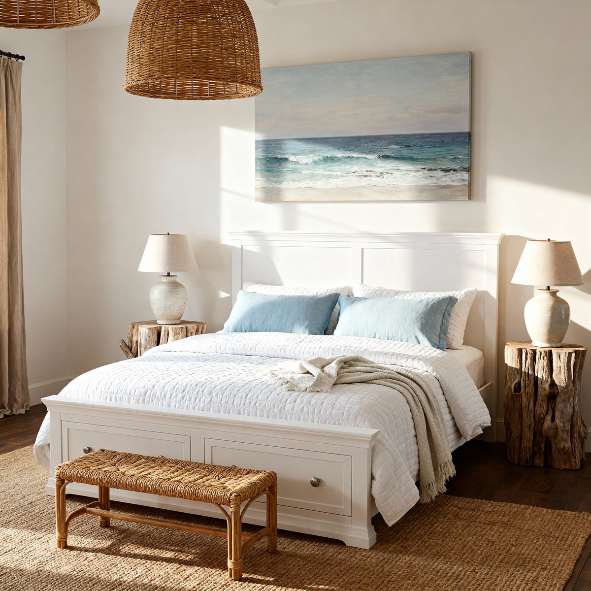 Manchester Pine Double Bed Frame with 2 Drawers made up in white and blue below a coastal painting