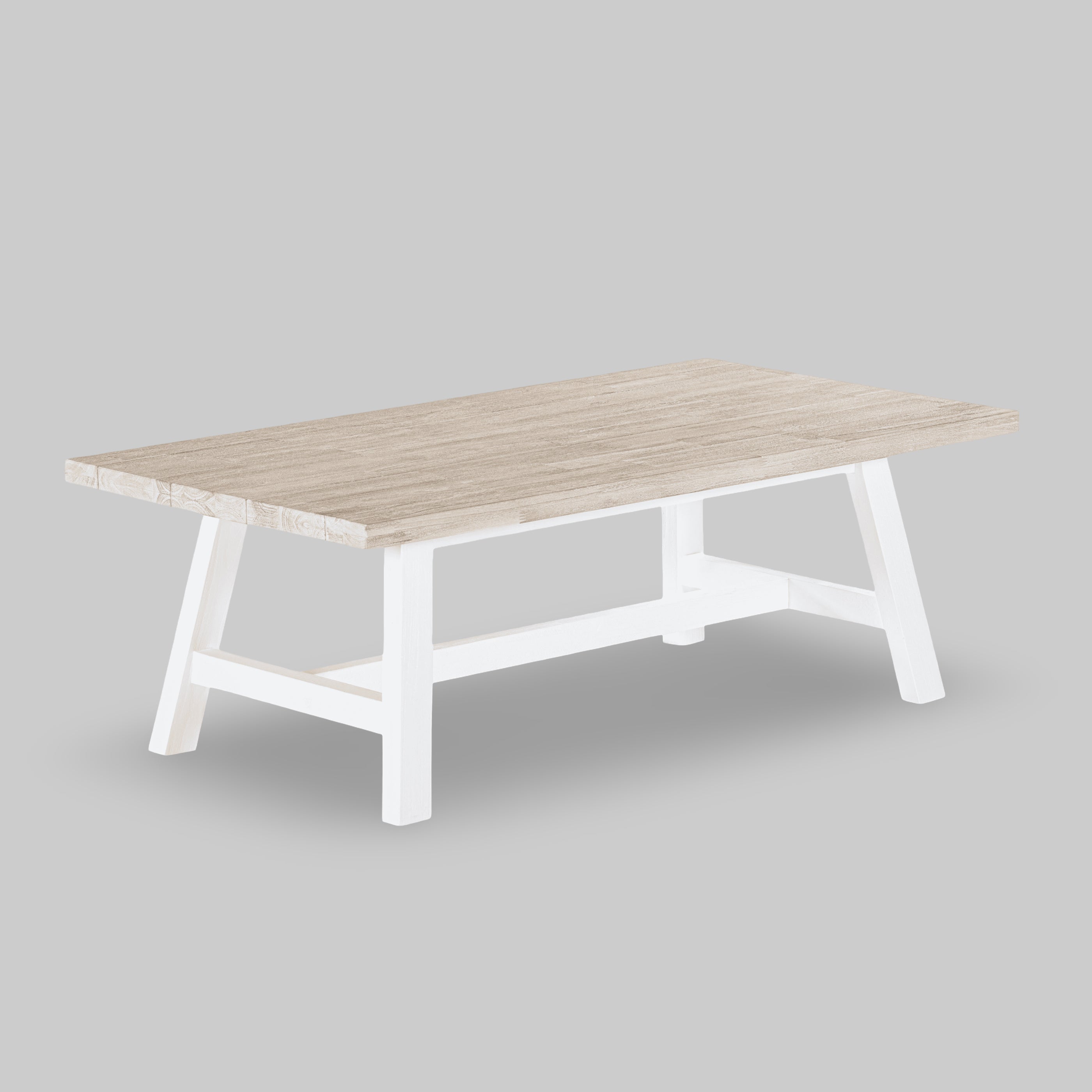 Wooden table with white legs on a gray background

