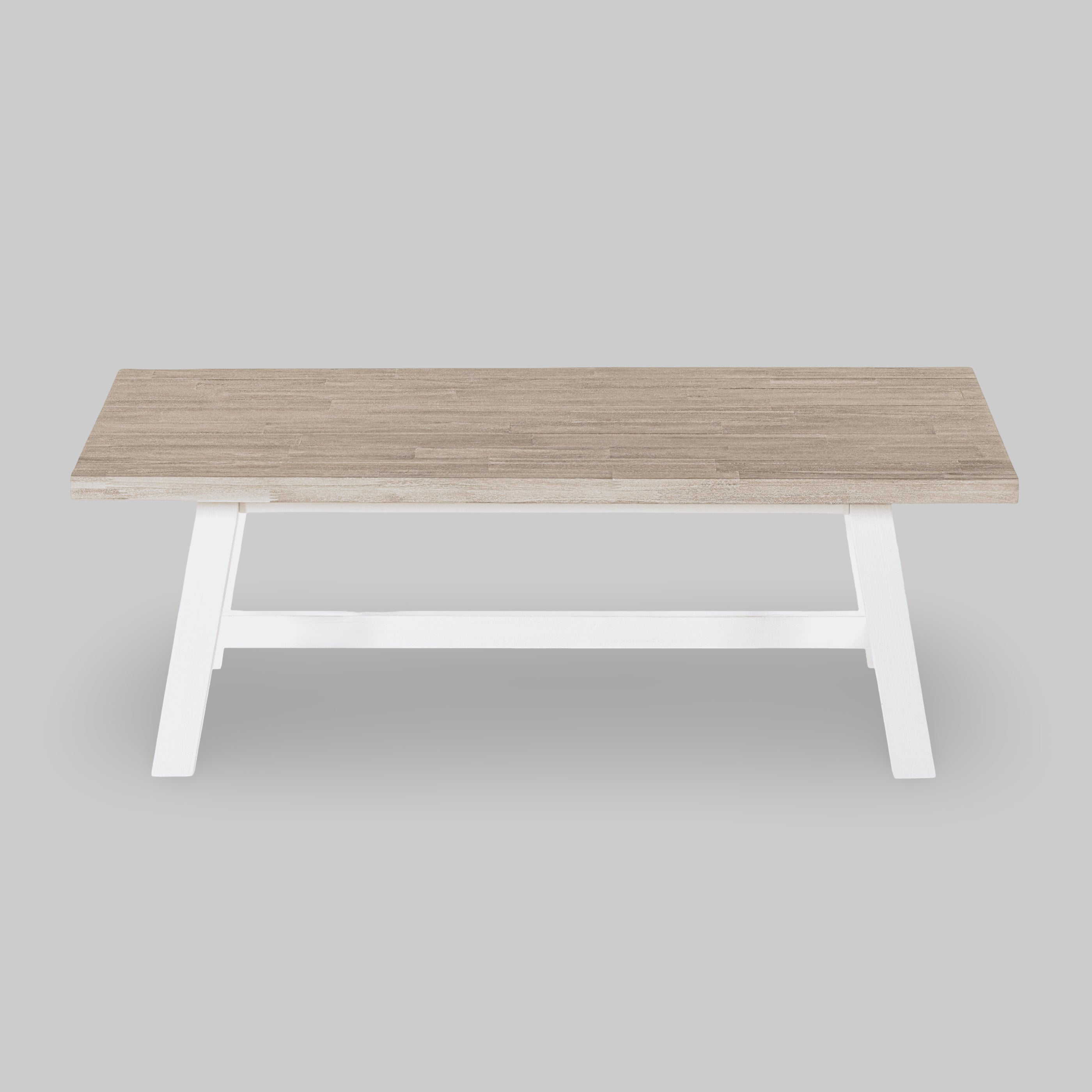 Wooden table with white legs on a gray background

