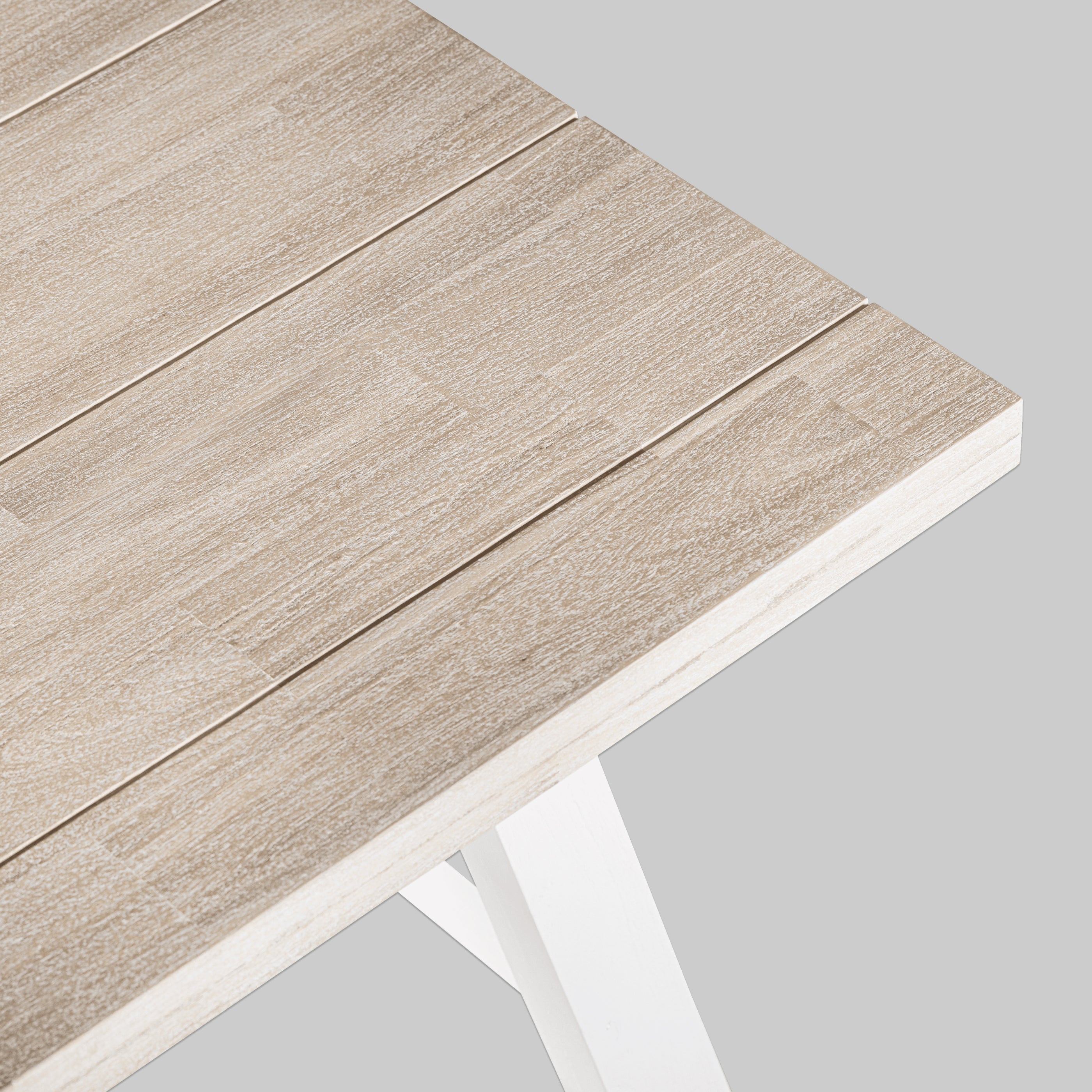 Wooden table with a light brown finish on a gray background

