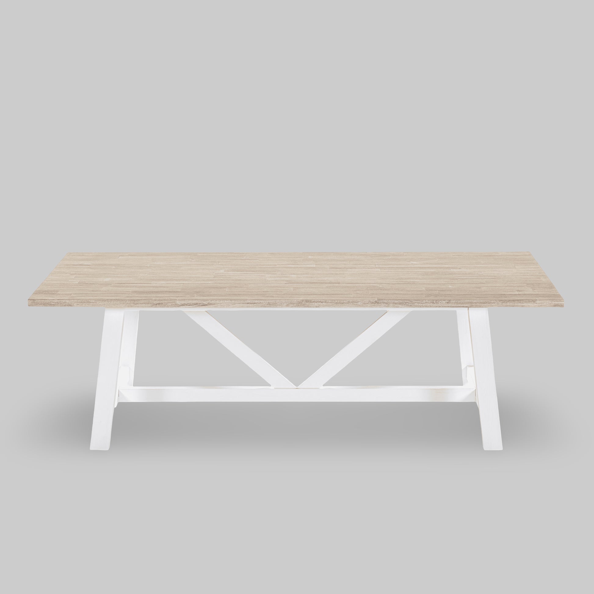 Wooden table with white base on a gray background

