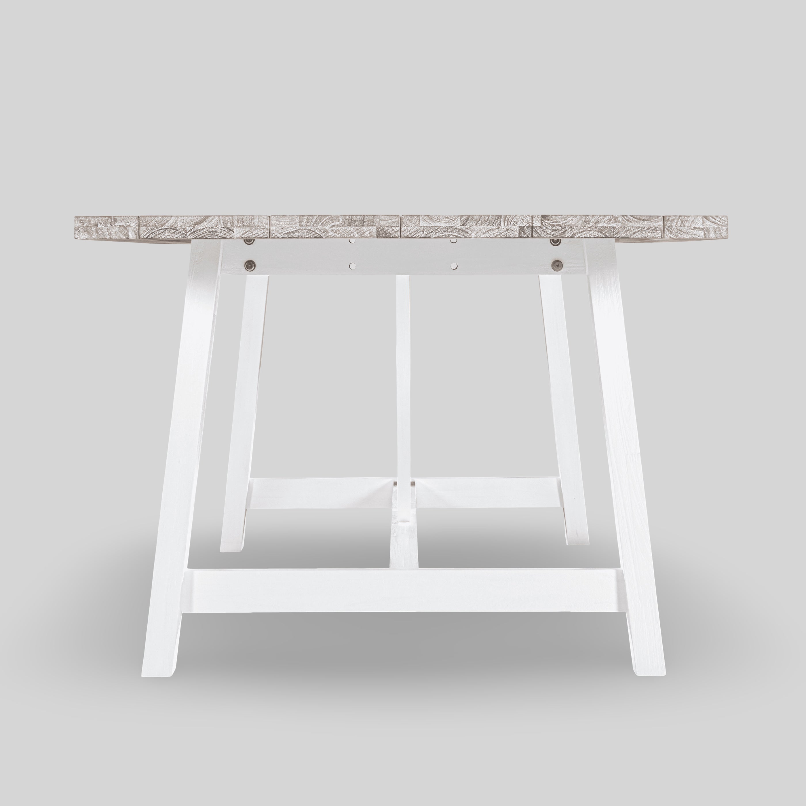 Wooden table with white metal legs on a light gray background

