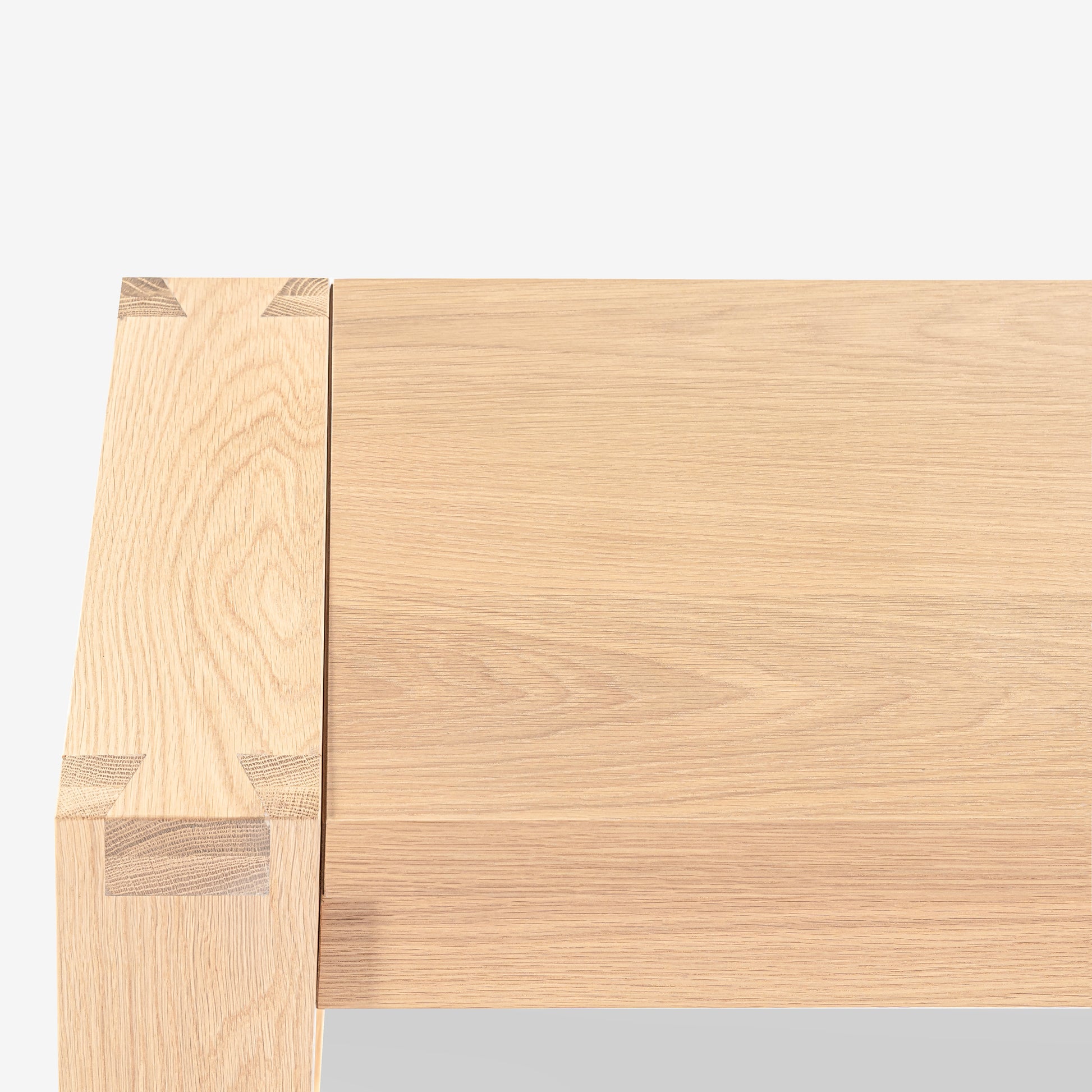 Close-up of a wooden surface with a light brown color on a white background

