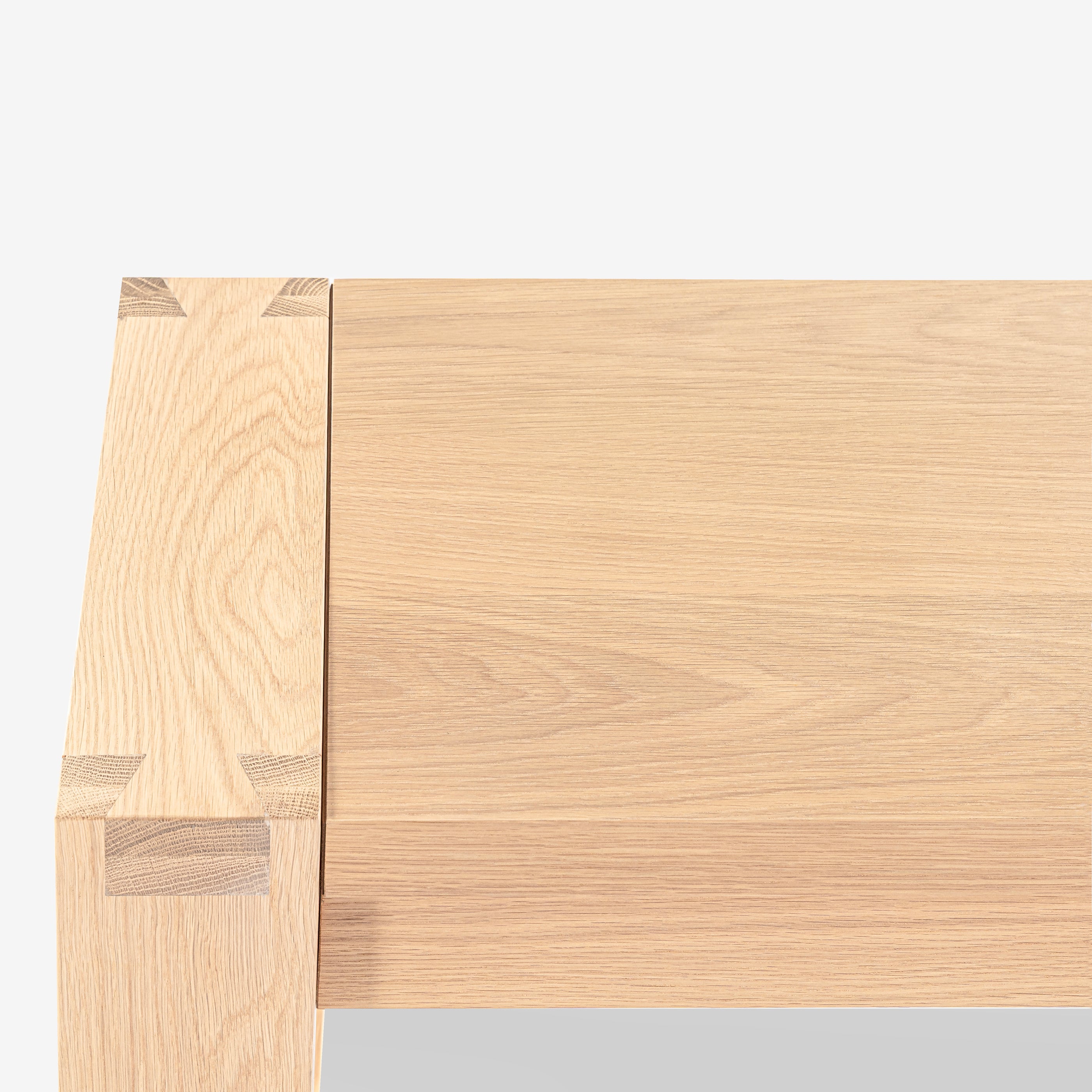 Close-up of a wooden surface with a light brown color on a white background

