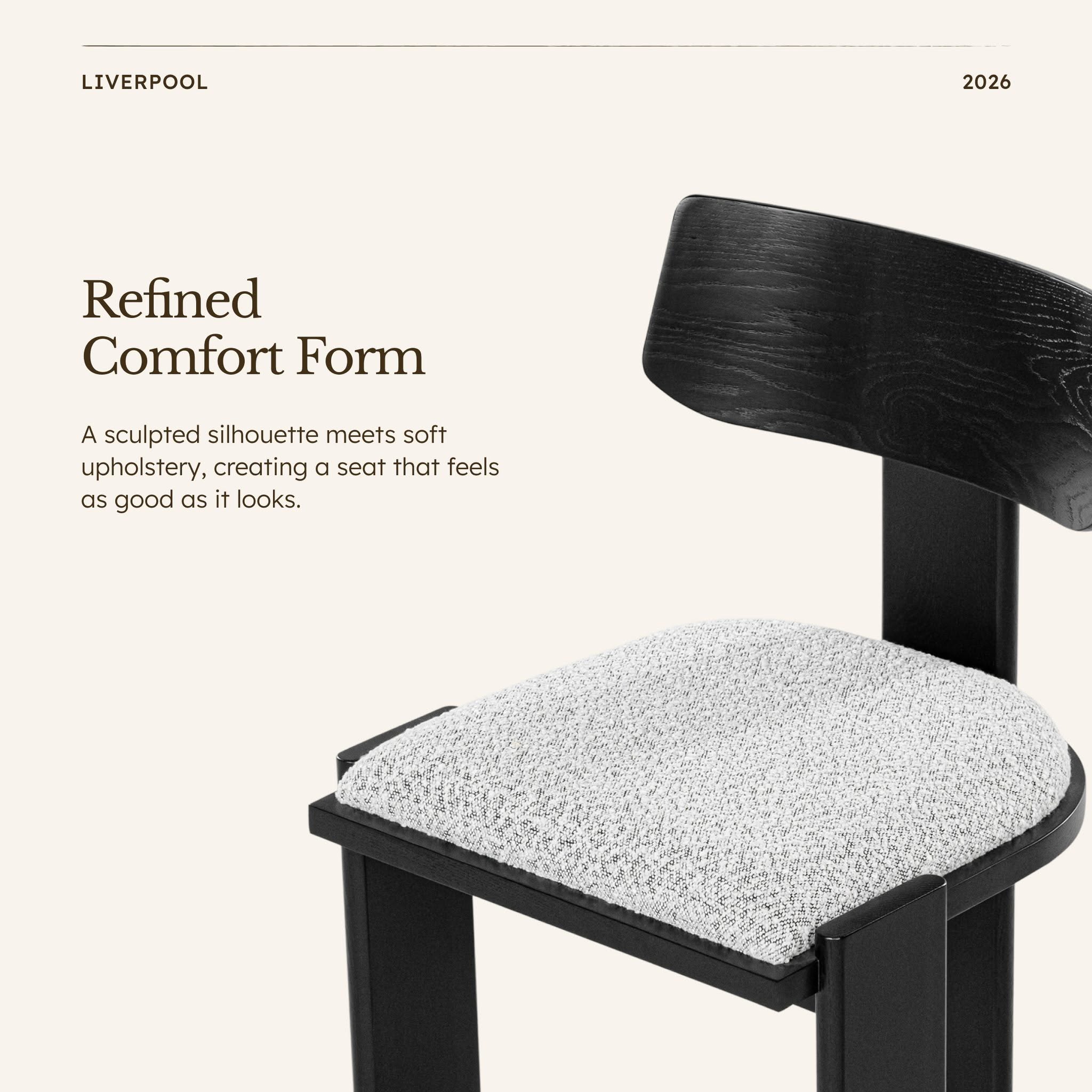 Liverpool Pine Dining Chair Set of 2 - Black shown in close-up highlighting the curved back and boucle seat