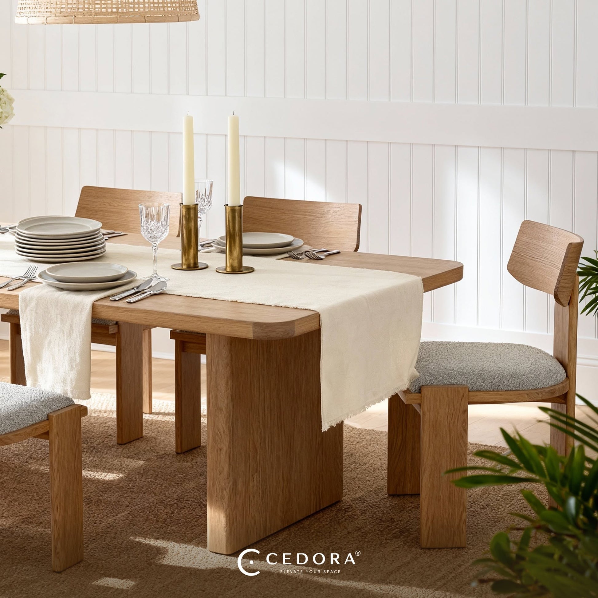 Liverpool Pine Dining Table 240cm - Natural laid with a linen runner, taper candles and stacked plates on a jute rug