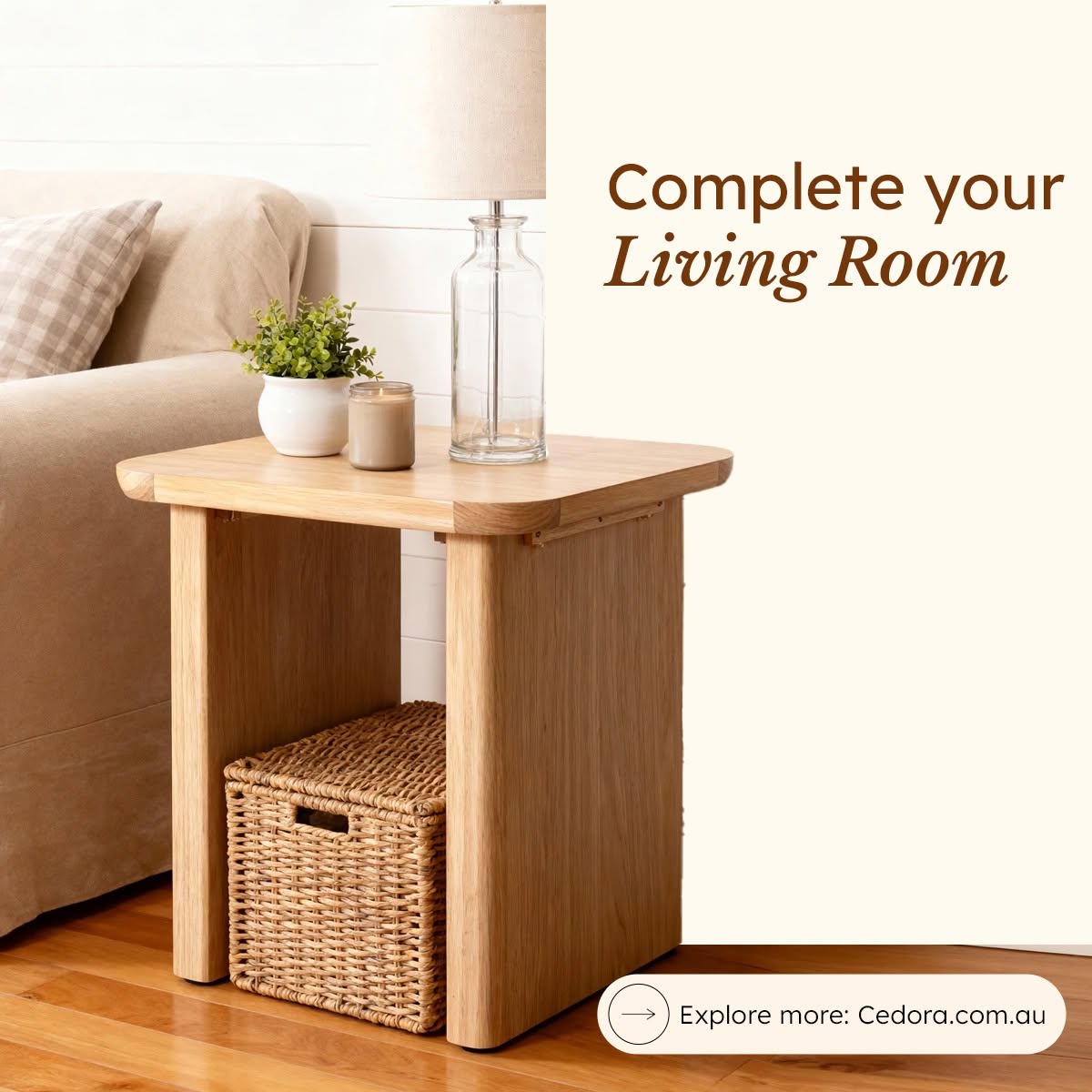 Liverpool Pine End Table - Natural beside a sofa with a lamp and woven basket, in a Cedora advert