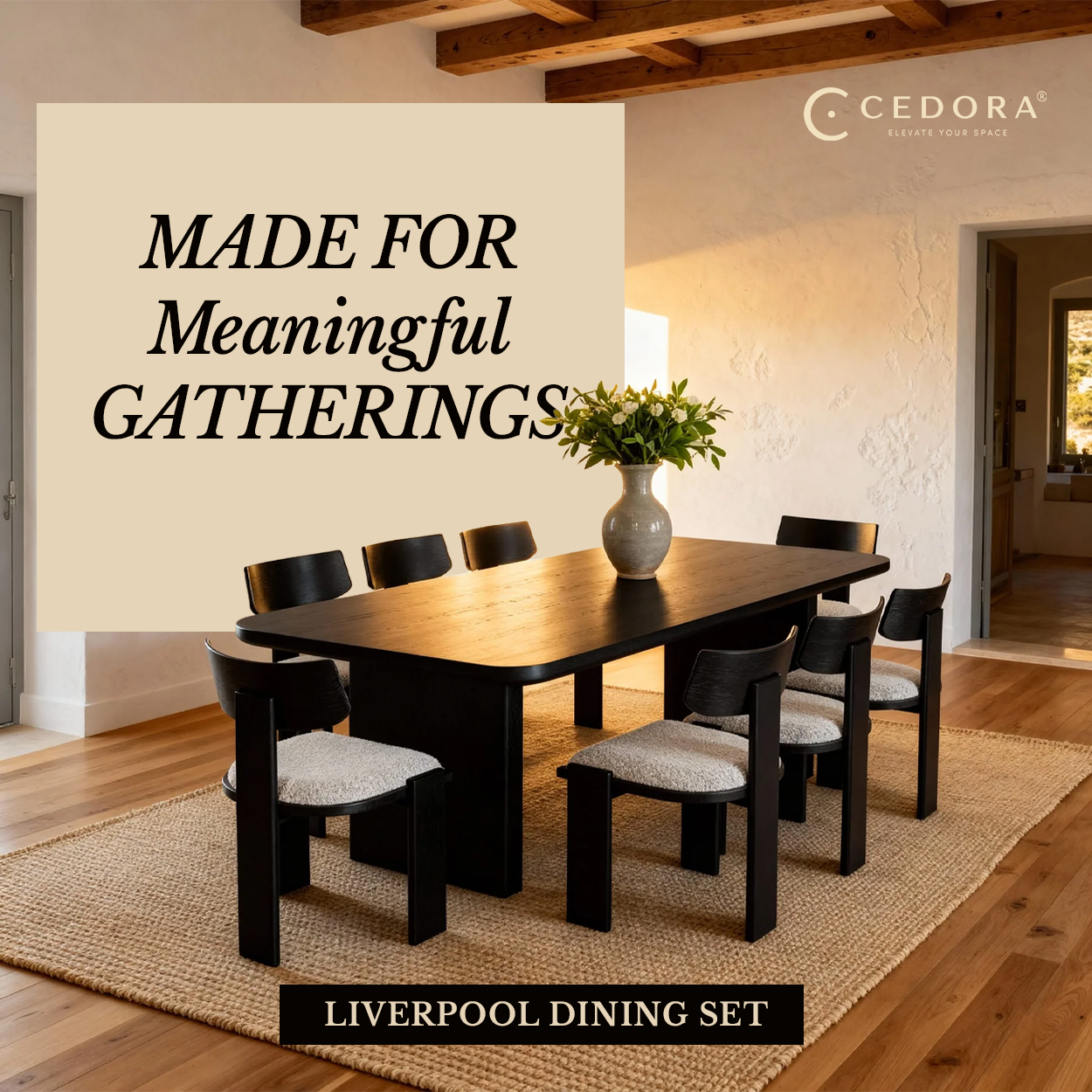 Liverpool Pine Dining Table 240cm - Black under exposed beams with a vase of blooms, in a Cedora advert